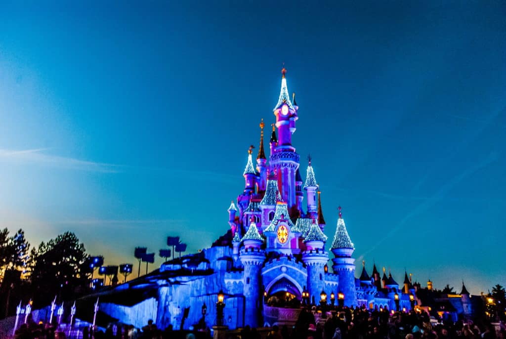 Sleeping beauty Castle at night with Christmas lights, Disneyland Park, Disneyland  Paris